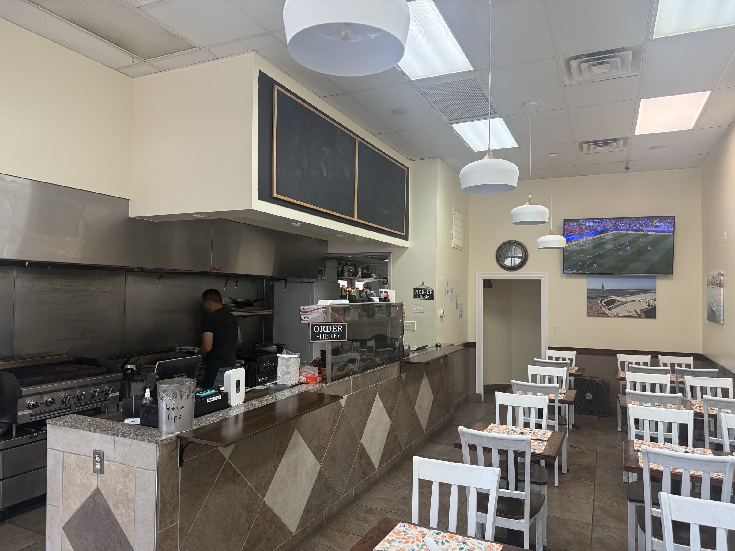 Cooking to order behind the counter